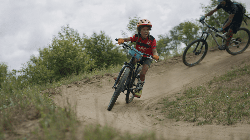 Mountain Biking on a berm.