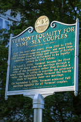 A green historic marker sign titled Vermont Equality for Same-Sex Couples.