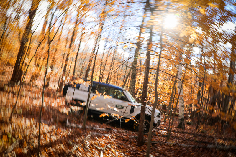 An artistic, motion shot the Land Rover Experience, during autumn.