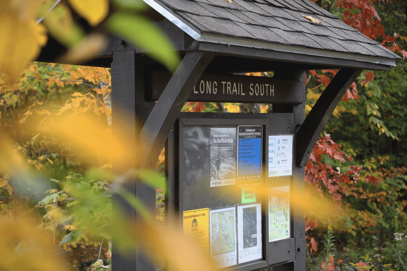 The covered kiosk for the Long Trail South during fall.