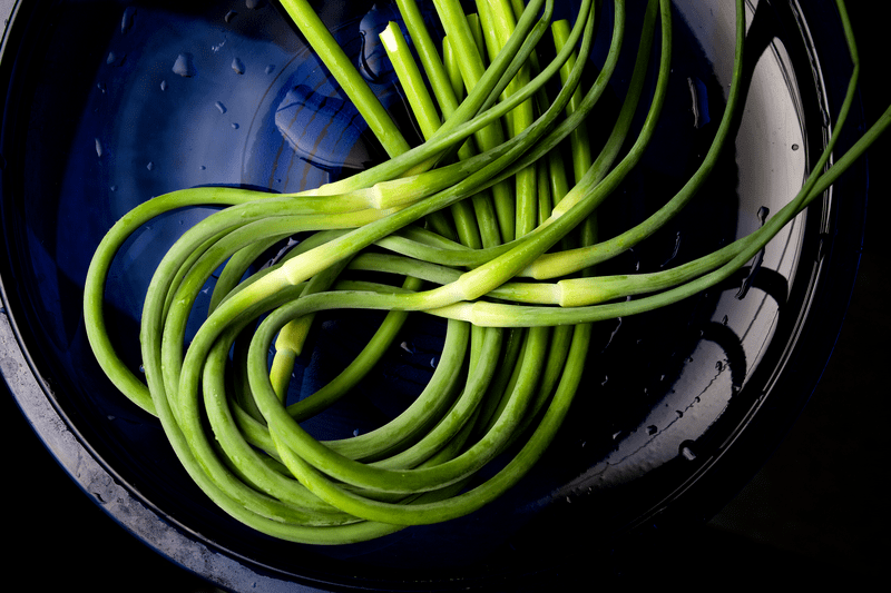 A detail shot of elegant, whimsical, farm fresh vegetables.