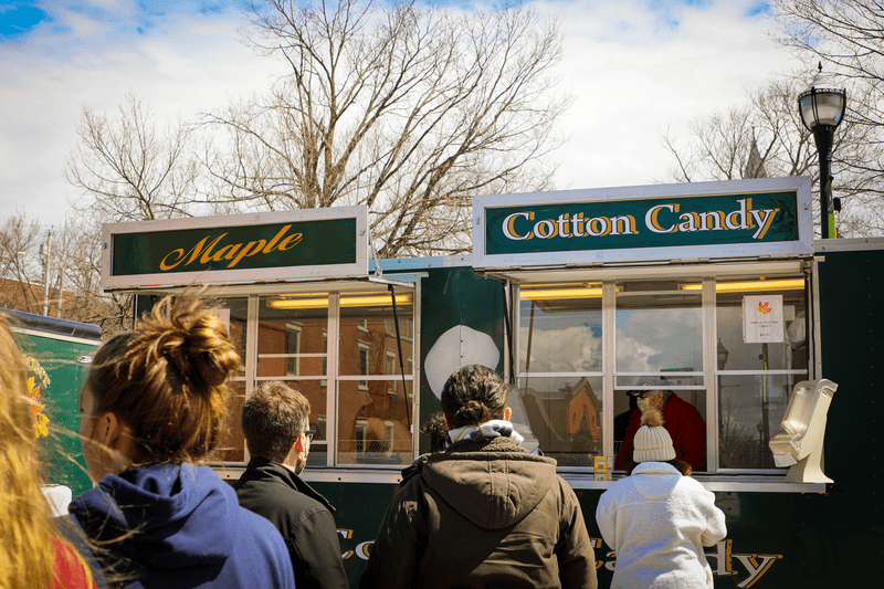 Maple products and Cotton Candy food truck at the Vermont Maple Festival.