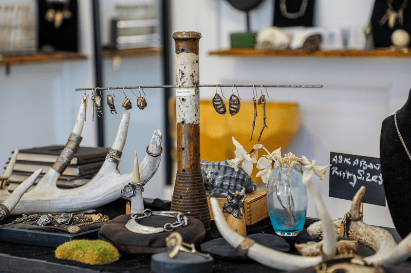 An artistic, product positioning display of jewelry within a store.