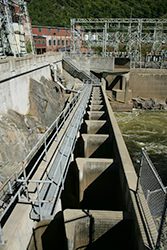 The fish ladder at a dam seen from above.