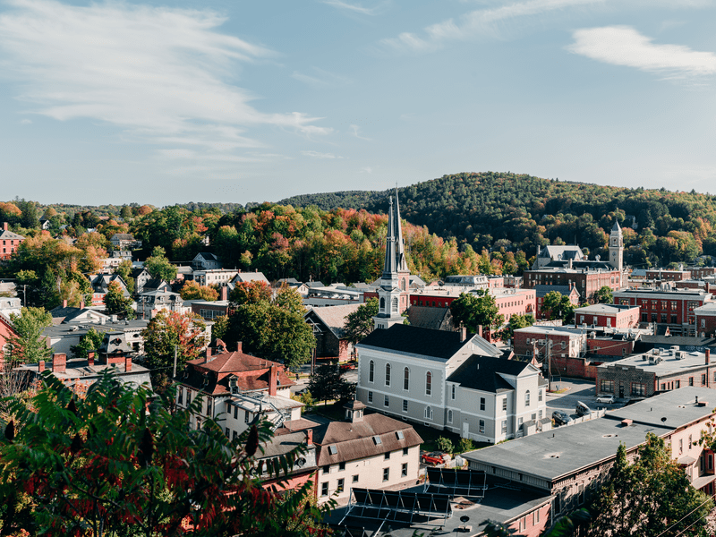 A rural mountain town is seen in the fall.