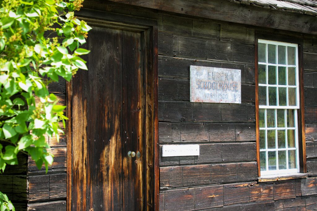 Door and signage at the Eureka School House.