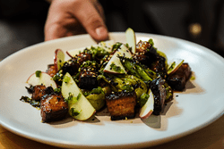 Food is displayed on a white plate.