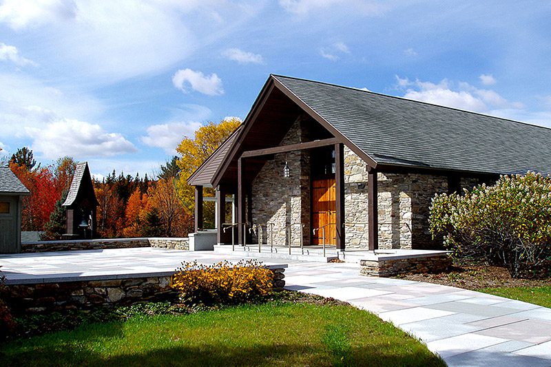 The entrance to a chapel in the fall.