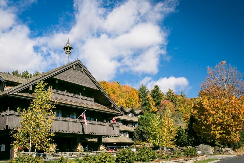 The von Trapp Family lodge with fall foliage.