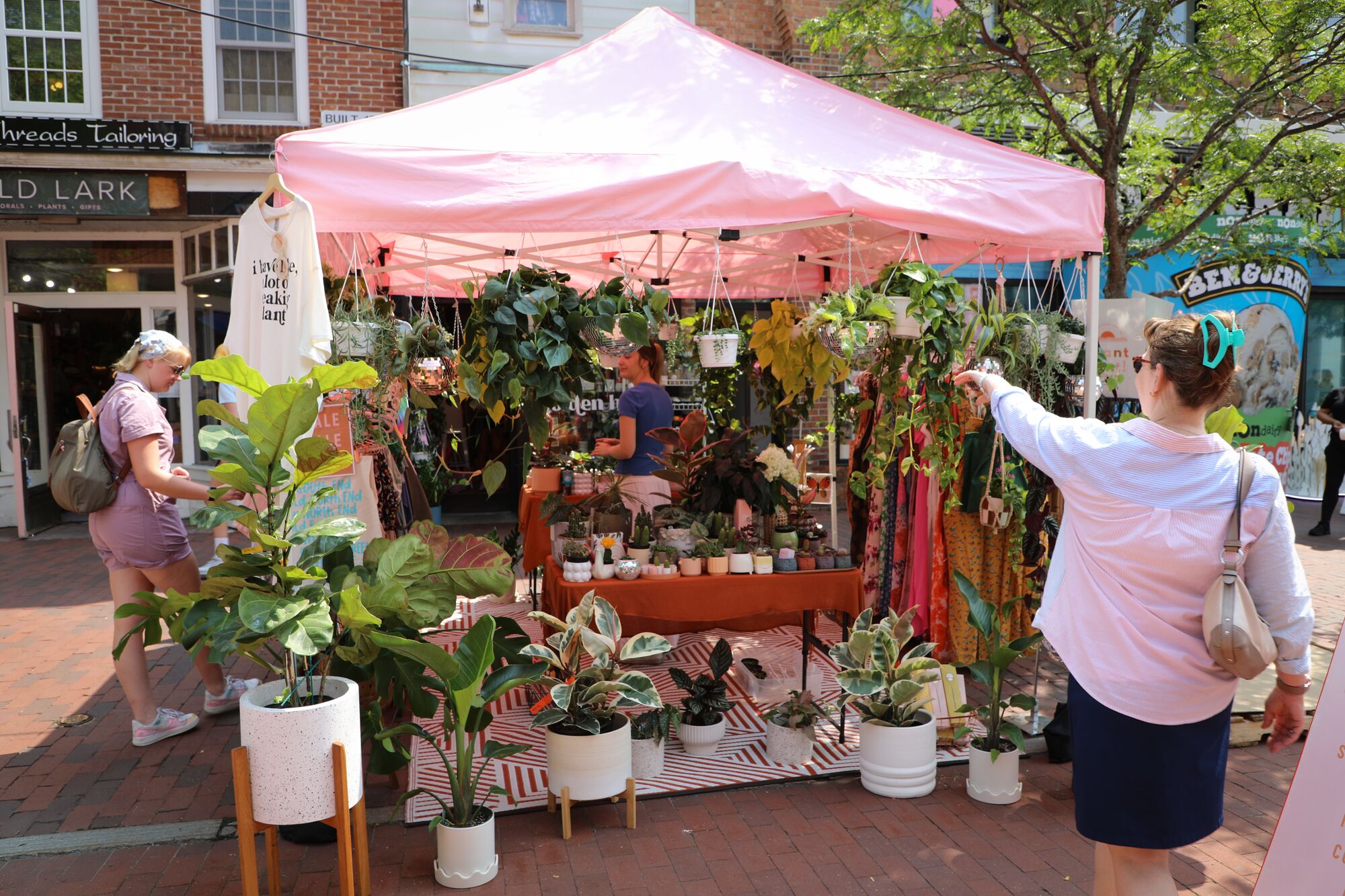 A customer speaks to a street vendor in Vermont.