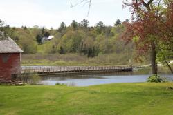 A bridge across a small lake in Vermont.