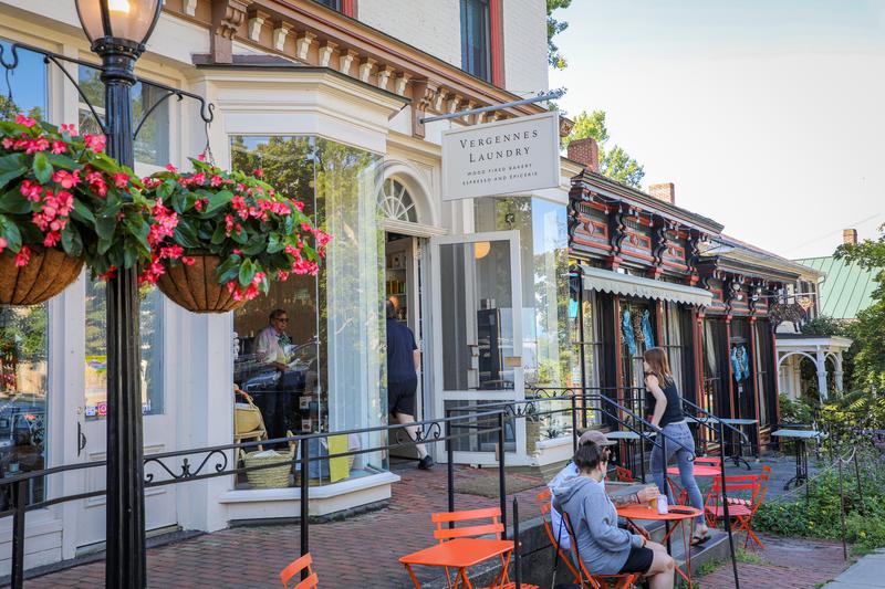 A downtown scene with outdoor cafe tables in Vermont.