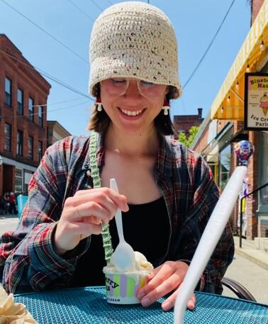 A person enjoys an ice cream sundae in Vermont.