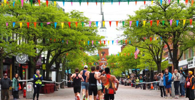 People compete in a running race.