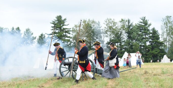 A group of historians fire an American Revolution cannon in Vermont.