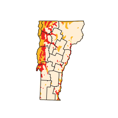 A graphic of Vermont with regions outlined. Most of the state is pale beige, but some red and orange can still be seen on the left.