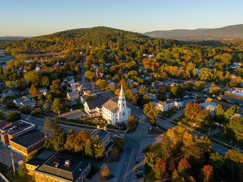Aerial view of Middlebury, Vermont, during autumn peak foliage.
